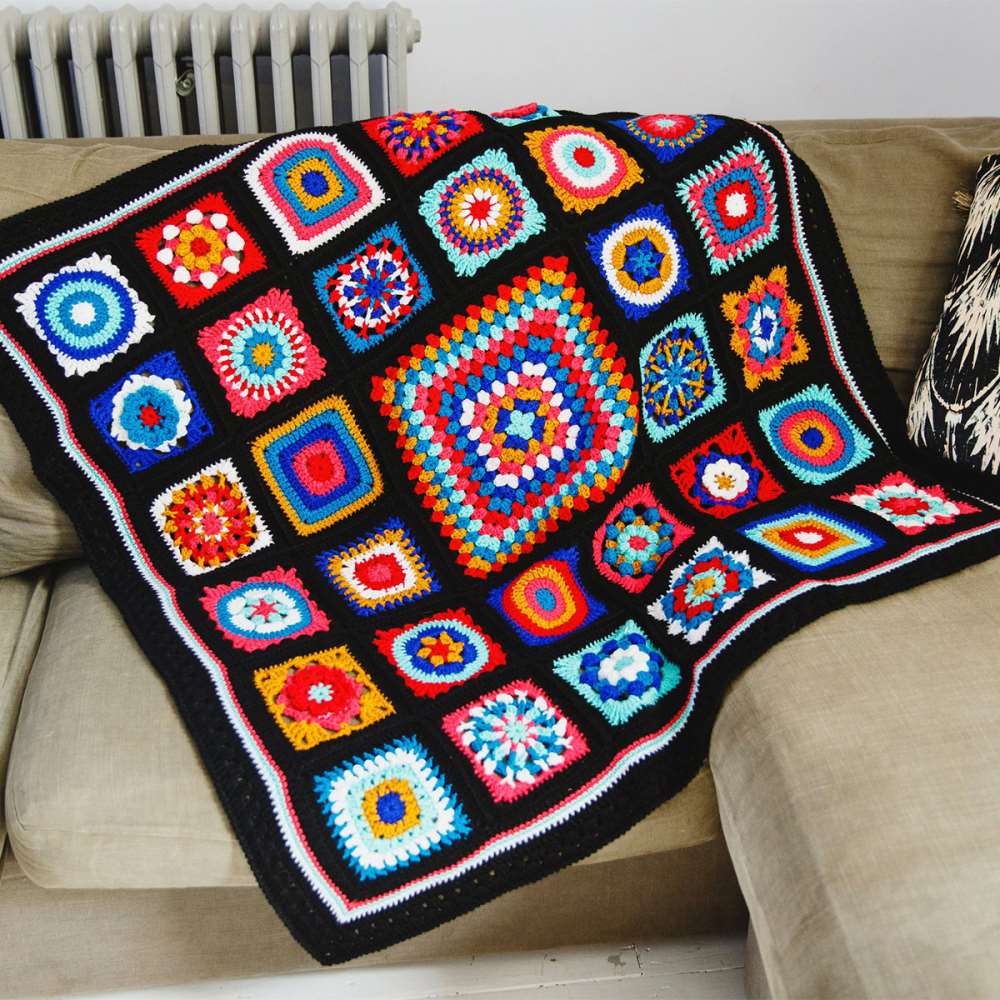Photograph of a colourful crochet blanket